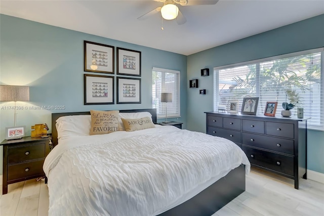 bedroom featuring ceiling fan and light wood-type flooring