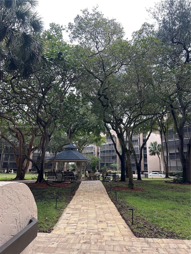 surrounding community featuring a yard and a gazebo