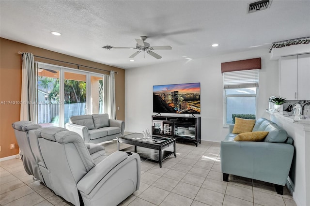 1588 SW 191st Ave, Pembroke Pines, FL 33029 - living area with a wealth of natural light, visible vents, and a ceiling fan