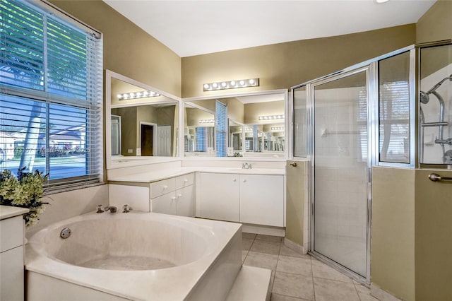 1588 SW 191st Ave, Pembroke Pines, FL 33029 - bathroom featuring a shower stall, tile patterned flooring, vanity, and a garden tub