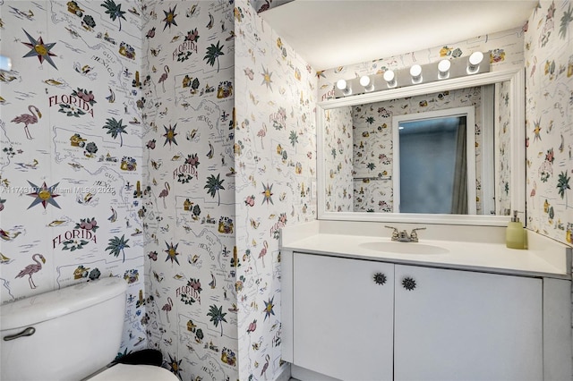 1588 SW 191st Ave, Pembroke Pines, FL 33029 - half bathroom featuring vanity, wallpapered walls, and toilet