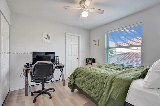 1588 SW 191st Ave, Pembroke Pines, FL 33029 - bedroom with light wood-style flooring, ceiling fan, and baseboards