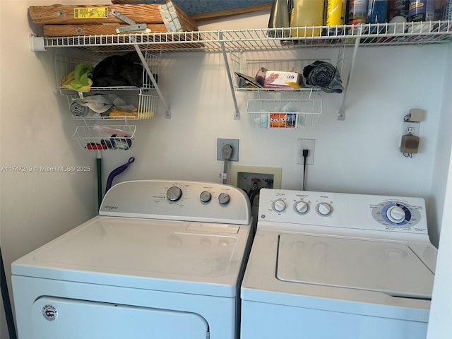 washroom with laundry area and separate washer and dryer