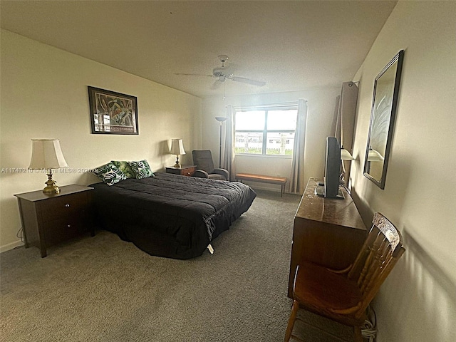 carpeted bedroom with a ceiling fan