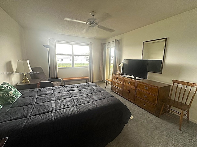 bedroom featuring carpet flooring, baseboards, and a ceiling fan