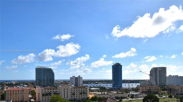 property's view of city featuring a water view