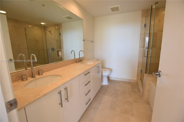 full bathroom featuring vanity, independent shower and bath, and toilet