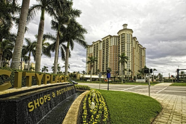 view of community featuring a yard