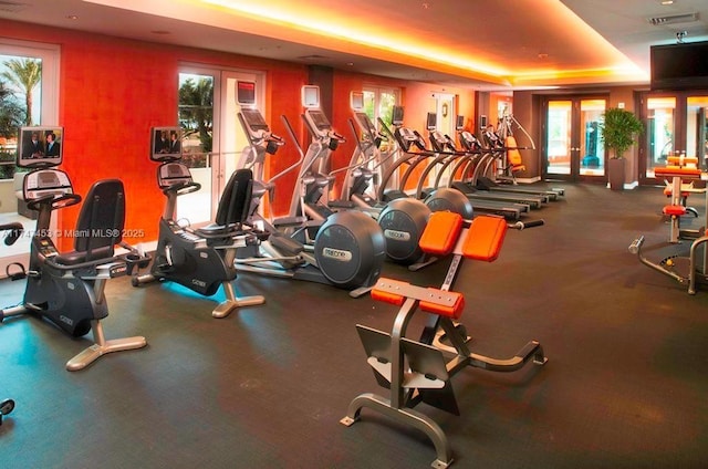 exercise room featuring french doors