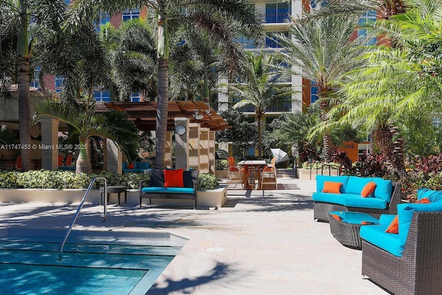 view of swimming pool featuring a patio and outdoor lounge area