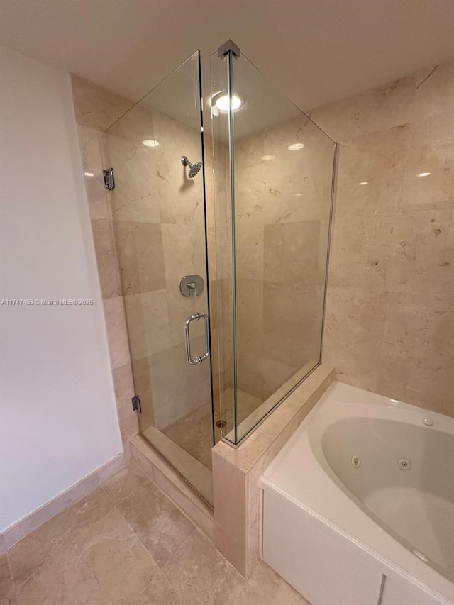 bathroom with independent shower and bath