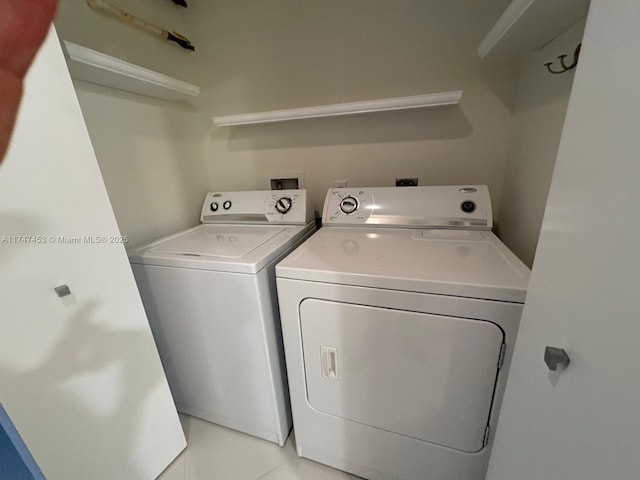 washroom with separate washer and dryer