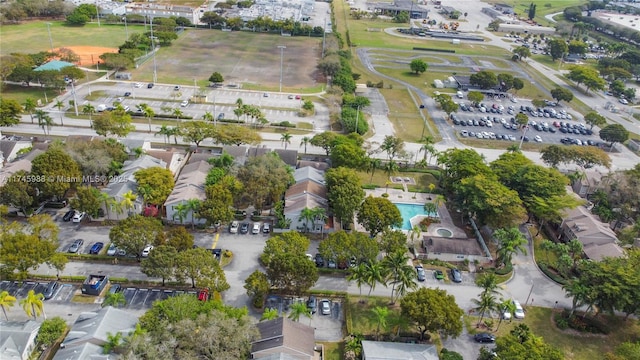 birds eye view of property with a residential view