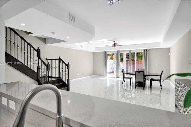 dining space featuring ceiling fan