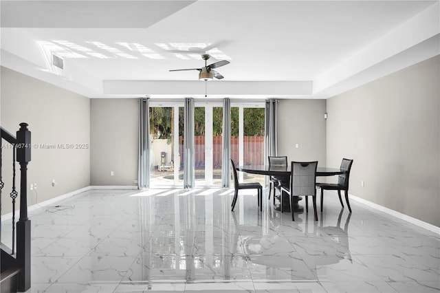 dining area with ceiling fan