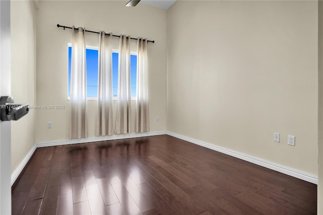 unfurnished room featuring wood-type flooring