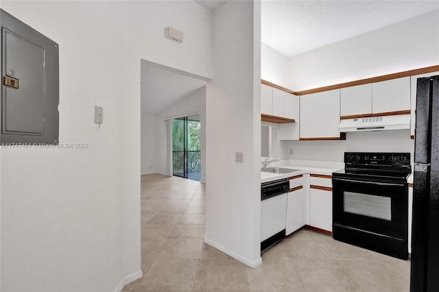 kitchen with black appliances, electric panel, light tile patterned flooring, sink, and white cabinetry