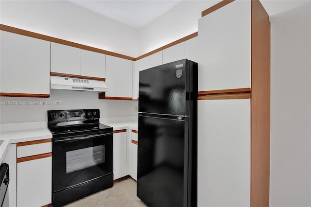 kitchen featuring white cabinets, ventilation hood, and black appliances