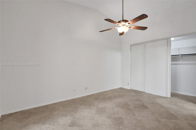 unfurnished bedroom featuring ceiling fan and vaulted ceiling