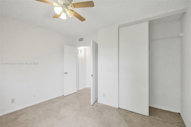 unfurnished bedroom featuring a closet and ceiling fan