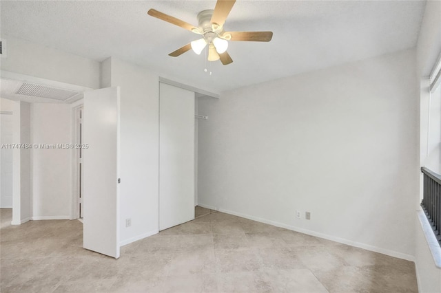 unfurnished bedroom with a closet and ceiling fan