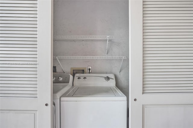 laundry area with washer and clothes dryer