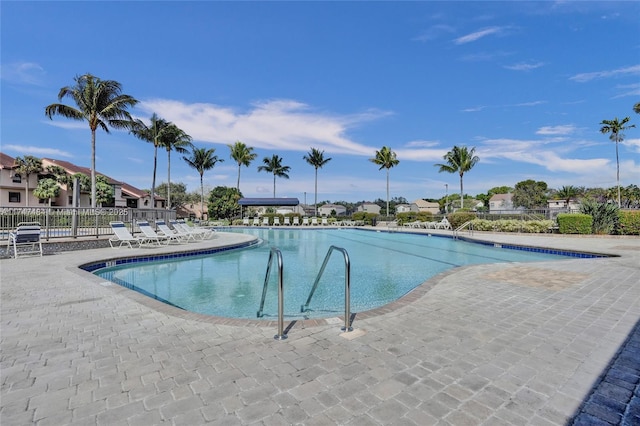 view of swimming pool with a patio