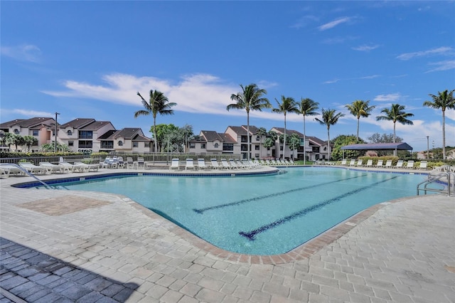 view of swimming pool featuring a patio area