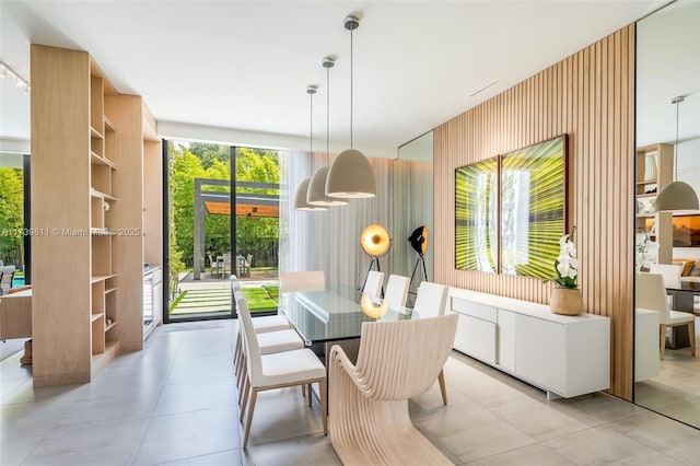dining area with light tile patterned floors