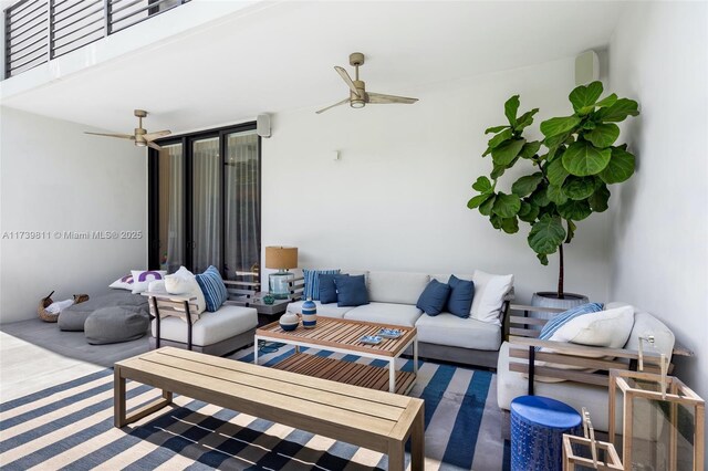 view of patio / terrace featuring an outdoor living space and ceiling fan