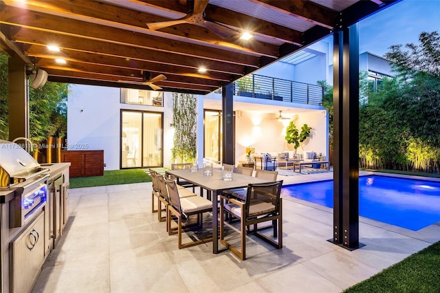 view of patio / terrace with area for grilling, a fenced in pool, a balcony, and ceiling fan