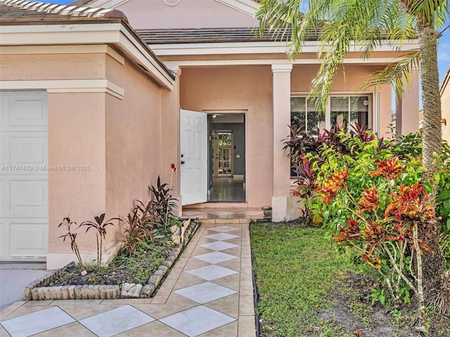 property entrance featuring a garage