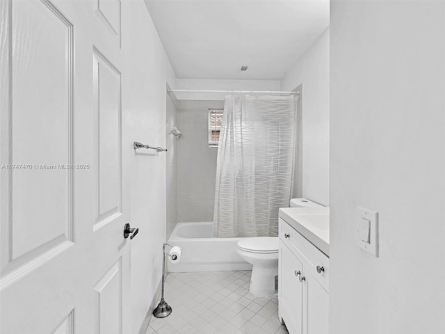 full bathroom featuring tile patterned floors, shower / tub combo, vanity, and toilet