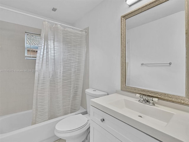 full bathroom with shower / tub combo with curtain, toilet, and vanity