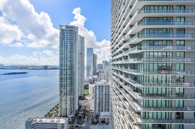 property's view of city featuring a water view