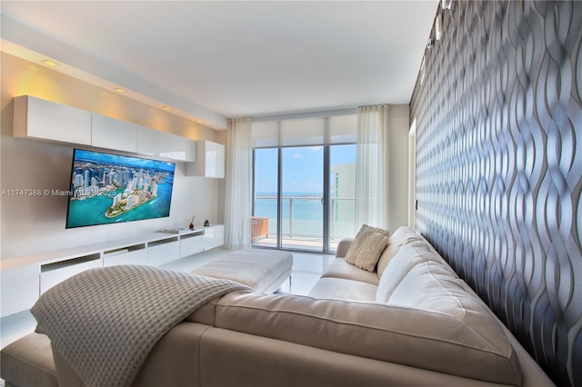 living room with floor to ceiling windows