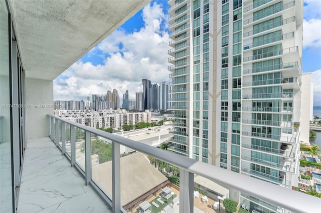 balcony featuring a city view