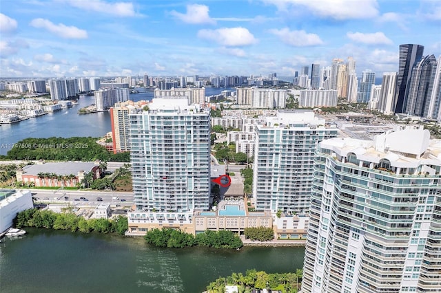 bird's eye view featuring a view of city and a water view