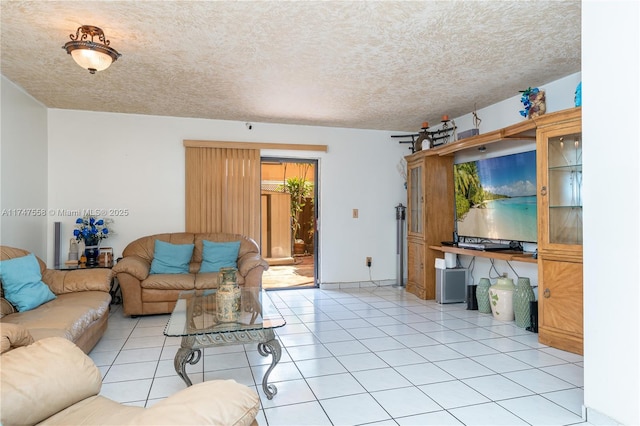 tiled living room featuring a textured ceiling