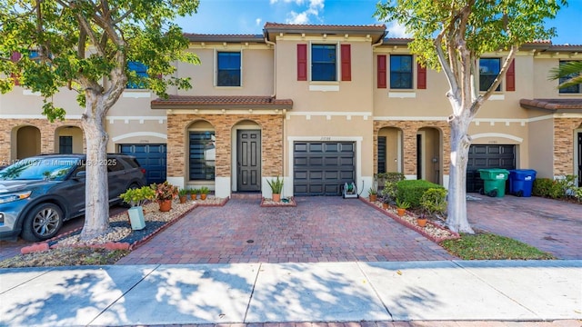 view of front of property featuring a garage