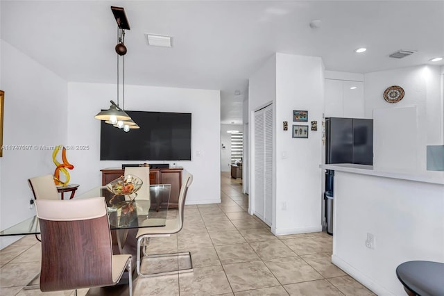 interior space with light tile patterned floors