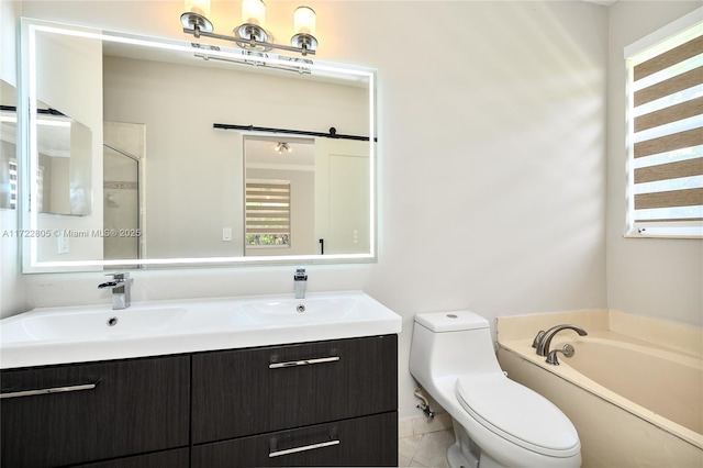 1632 NE Winterberry Ln, Weston, FL 33327 - full bath featuring a garden tub, a sink, toilet, and double vanity