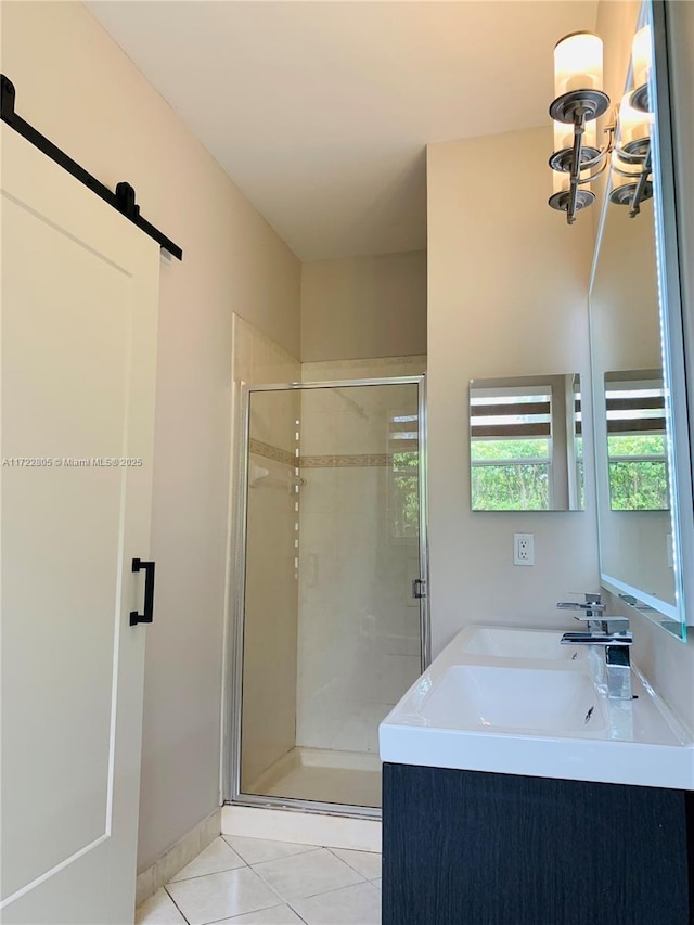 1632 NE Winterberry Ln, Weston, FL 33327 - bathroom featuring double vanity, a shower stall, and tile patterned floors