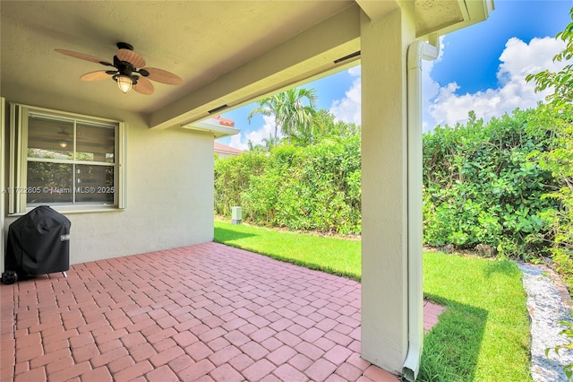 1632 NE Winterberry Ln, Weston, FL 33327 - view of patio / terrace with grilling area and a ceiling fan