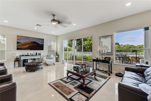 living room with ceiling fan