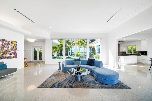 7331 Belle Meade Island Dr, Miami, FL 33138 - living area with ornamental molding, dark aggregate flooring, healthy amount of natural light, baseboards, and recessed lighting