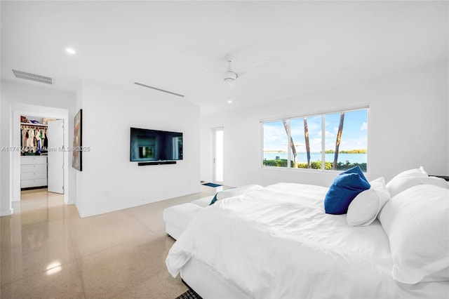 7331 Belle Meade Island Dr, Miami, FL 33138 - bedroom with a walk in closet, recessed lighting, ceiling fan, and a closet