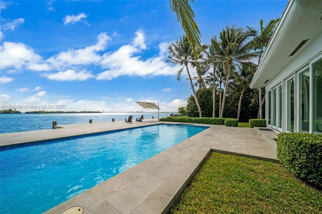 7331 Belle Meade Island Dr, Miami, FL 33138 - outdoor pool with a patio and a water view