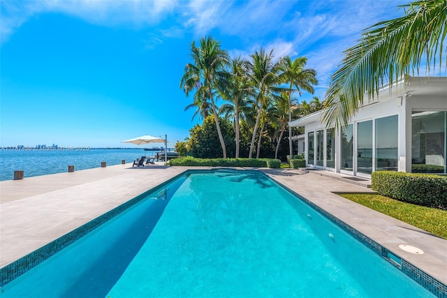7331 Belle Meade Island Dr, Miami, FL 33138 - outdoor pool featuring a patio area and a water view