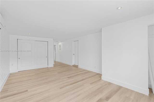 unfurnished room featuring light hardwood / wood-style flooring